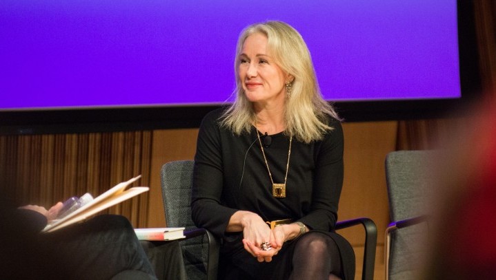 Photo of Defining Innovation speaker sitting on stage talking