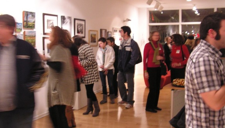 Patrons viewing art at The Art Trust at Meridian Bank